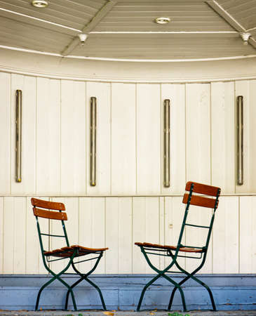 two folding chairs at a pavillionの写真素材