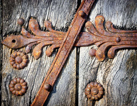 old rusty ornament at a historic door