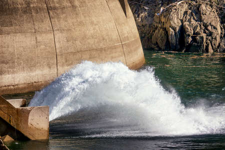 waterfall at a reservoirの写真素材