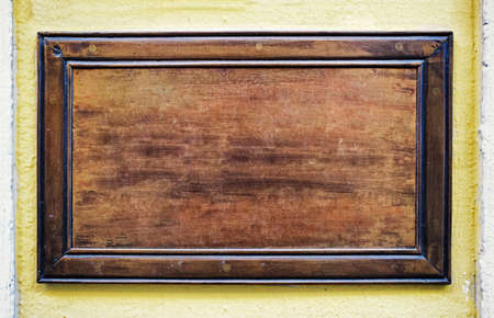 blank sign at a wallの写真素材