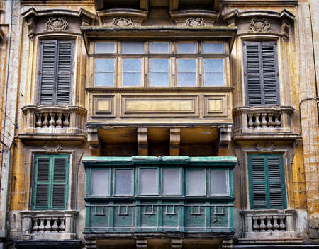 Typical Maltese covered balconies in Vallettaの写真素材