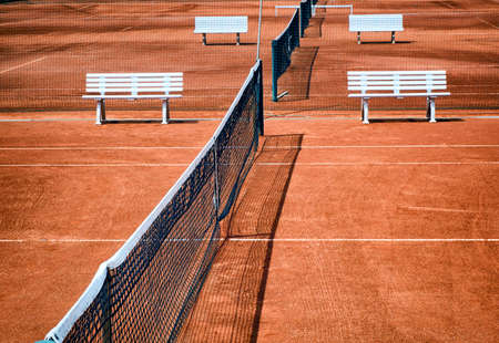 new tennis court and benchesの写真素材