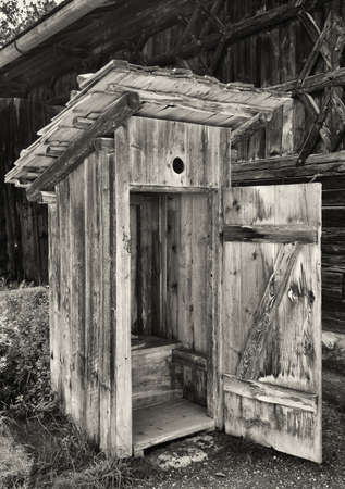 old wooden outhouse at a farmの写真素材