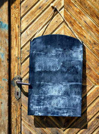 old wooden black board with space for textの写真素材