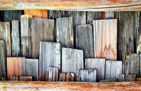 old wooden shingles at a hut - nice backgroundの写真素材