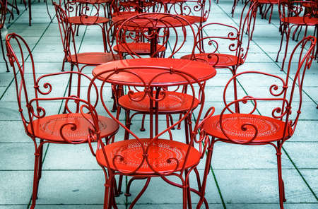 sidewalk cafe tables and chairsの写真素材