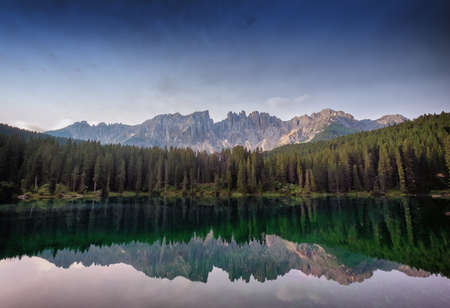 karerlake in italy - Lago di Carezza - at the background the dolomites