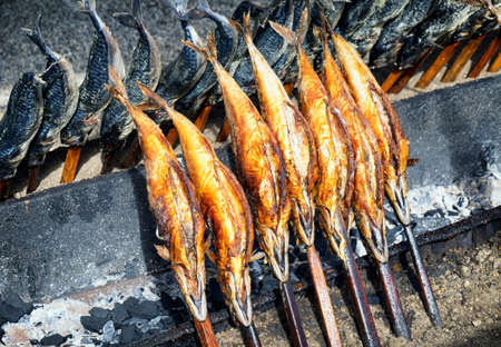 typical bavarian steckerlfisch at the oktoberfest - germanyの写真素材
