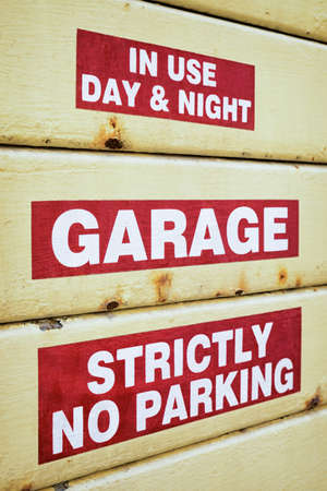 no parking sign at a garageの写真素材