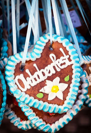 typical souvenir at the oktoberfest in munich - a gingerbread heart - lebkuchenherzの写真素材