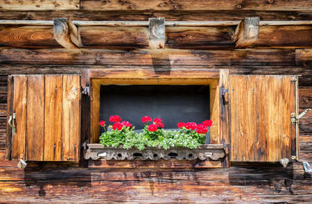 window of a typical old austrian farmhouseの写真素材
