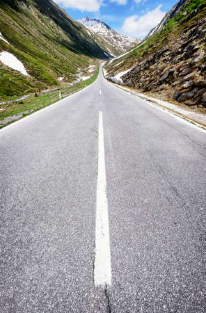 country road at the european alpsの写真素材