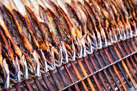 typical bavarian steckerlfisch at the oktoberfest - germanyの写真素材