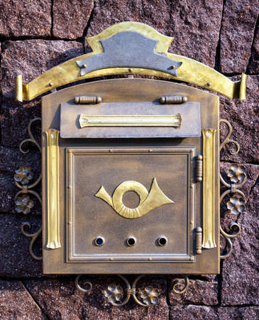 old letterbox at a front door