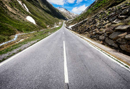 country road at the european alpsの写真素材