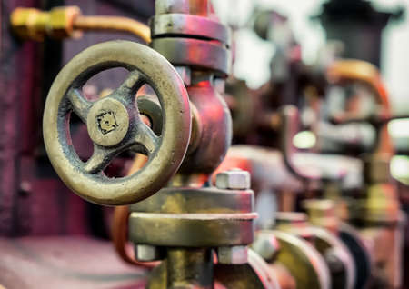 steering wheel at an old machineの写真素材