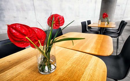 table and chairs at a cafeteriaの写真素材