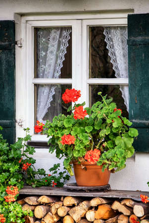window of a typical old austrian farmhouseの写真素材