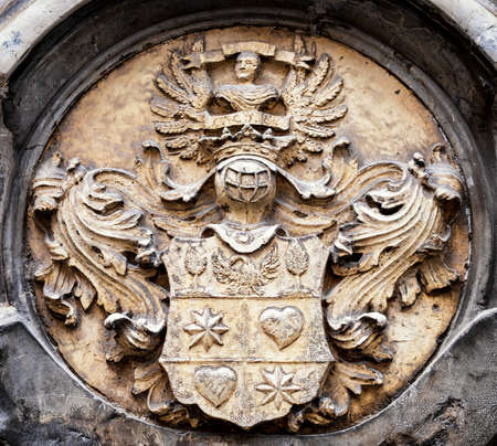 old coat of arms at a churchの写真素材