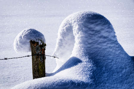 fence in winter - closeup - photoの写真素材