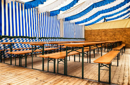 chairs at a bavarian beergarden  -oktoberfestの写真素材