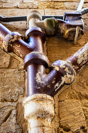 group of drainpipes at a house