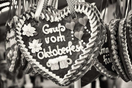 typical souvenir at the oktoberfest in munich - a gingerbread heart - lebkuchenherzの写真素材