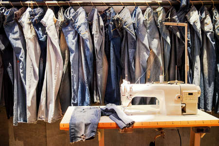 jeans trousers in a row