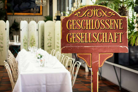 old reserved sign at a restaurant in germanyの写真素材