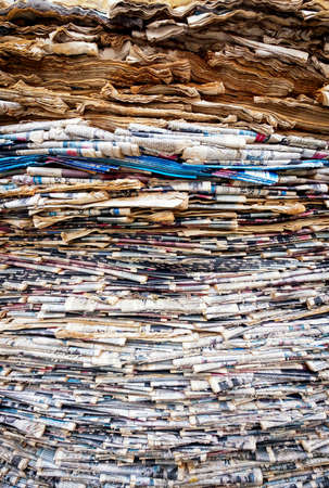 tower of old weathered newspapersの写真素材