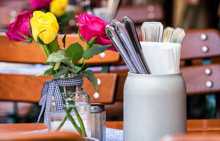 typical mug and silverware at a bavarian beergardenの写真素材