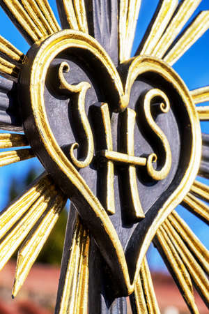 antique cross - IHS - as a synonym for jesusの写真素材