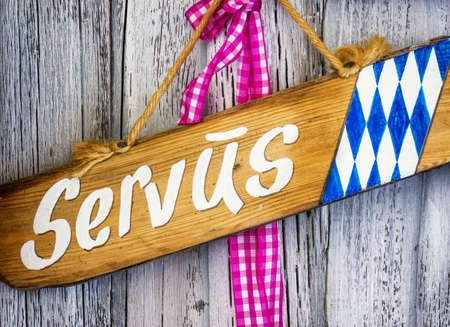 beautiful bavarian open sign at a storeの写真素材