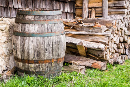 old wooden wine cask at a farmhouseの写真素材