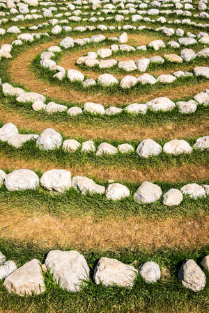 rows of rocks at a meadowの写真素材