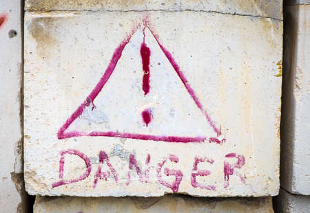 old danger sign with Exclamation Pointの写真素材