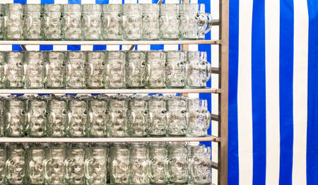 group of mugs at a bavarian beergardenの写真素材