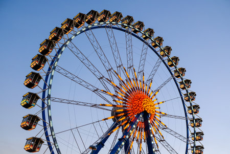 famous ferris wheel at the oktoberfest in munich - germanyのeditorial素材