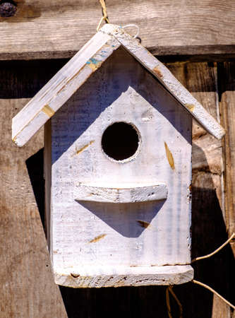 typical wooden birdhouse - closeup - photoの写真素材