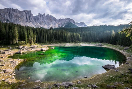 karerlake in italy - Lago di Carezza - at the background the dolomitesの写真素材