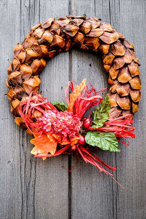 old wreath at a doorの写真素材