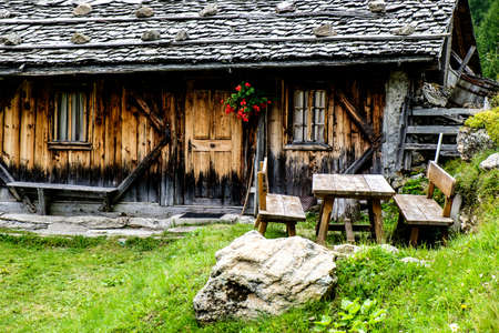 old log cabin at the european alpsの写真素材