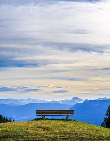 bench on the blomberg mountain in bavariaの写真素材