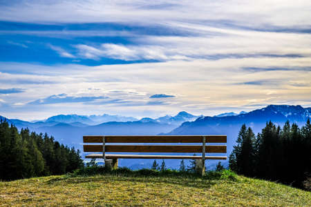 bench on the blomberg mountain in bavariaの写真素材