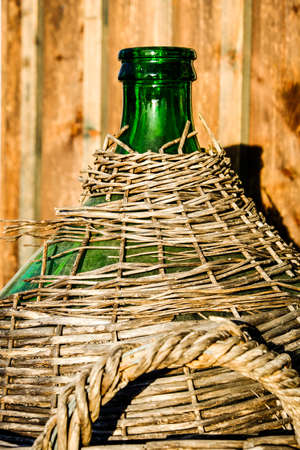 old wine bottle at a cellarの写真素材