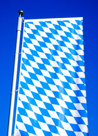 the bavarian flag in front of blue sky