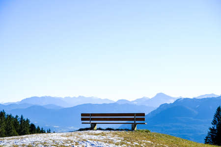 bench on the blomberg mountain in bavariaの写真素材