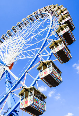 famous ferris wheel at the oktoberfest in munich - germanyのeditorial素材