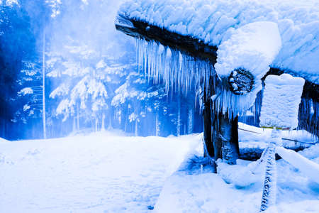 icicles at a hut in winterの写真素材
