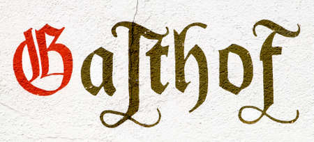 antique hotel sign in germanyの写真素材